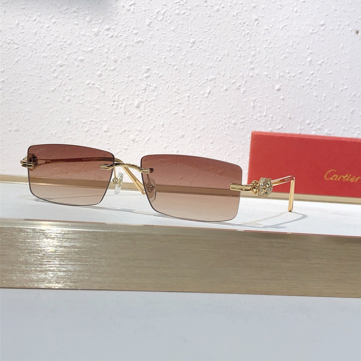 10-farbige randlose Sonnenbrille mit Pantherkopf CT0647S