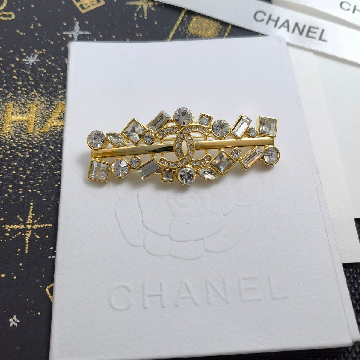 Strassbrosche in Gold