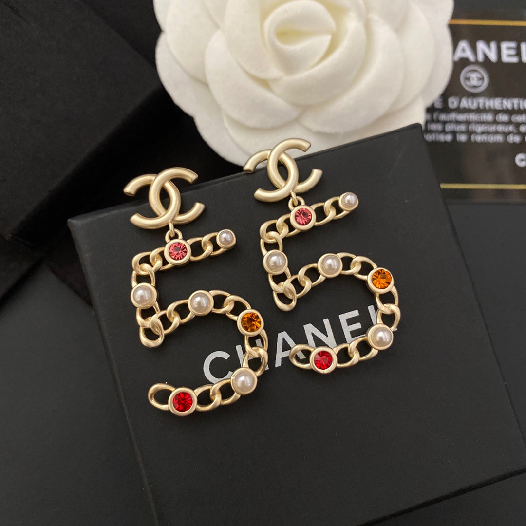 Neue Nr. 5 farbige Diamantohrringe