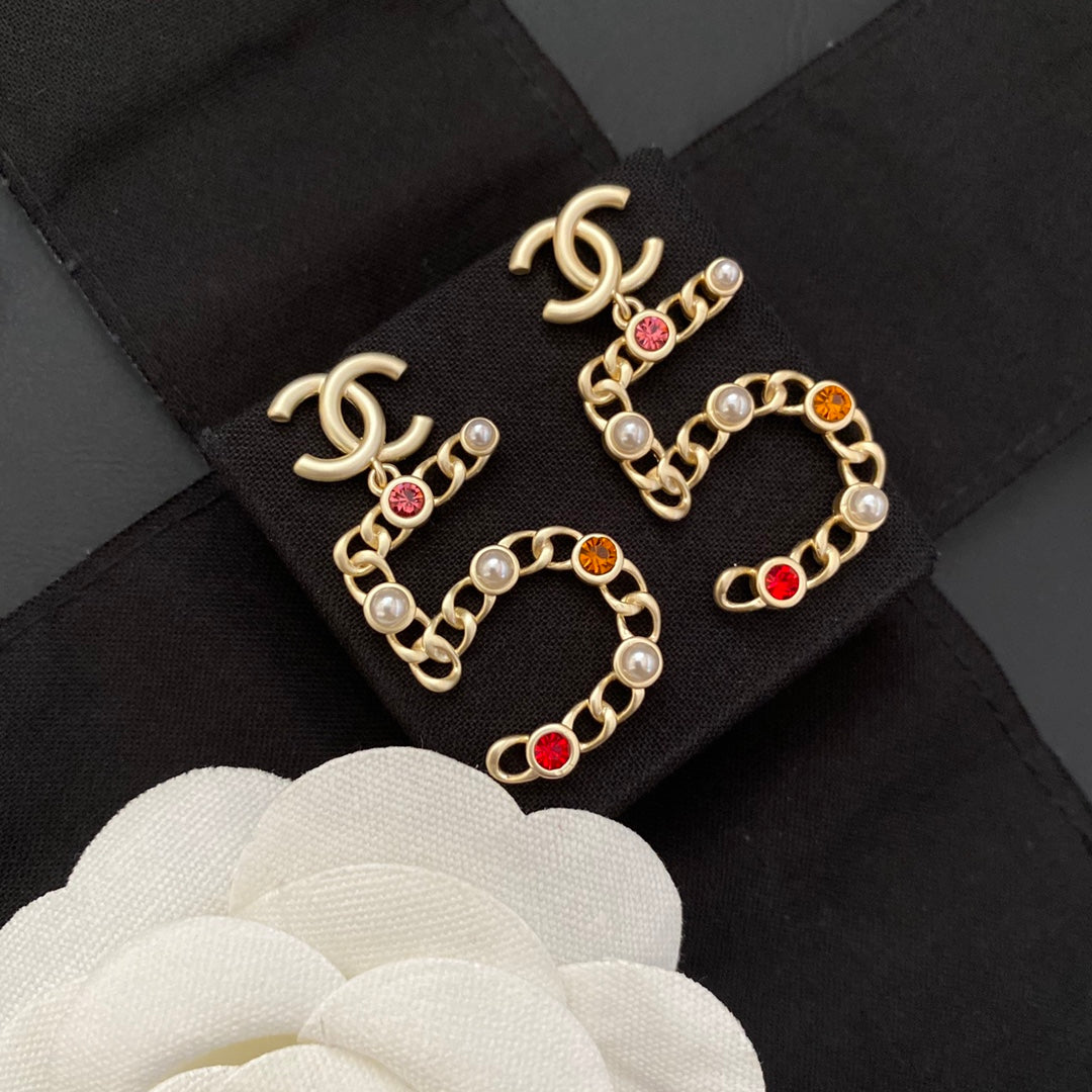Neue Nr. 5 farbige Diamantohrringe