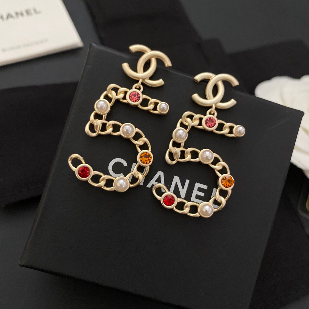 Neue Nr. 5 farbige Diamantohrringe