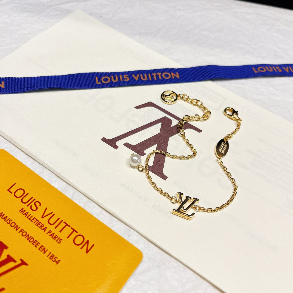 Ikonisches Logo Perlenschmuck-Set