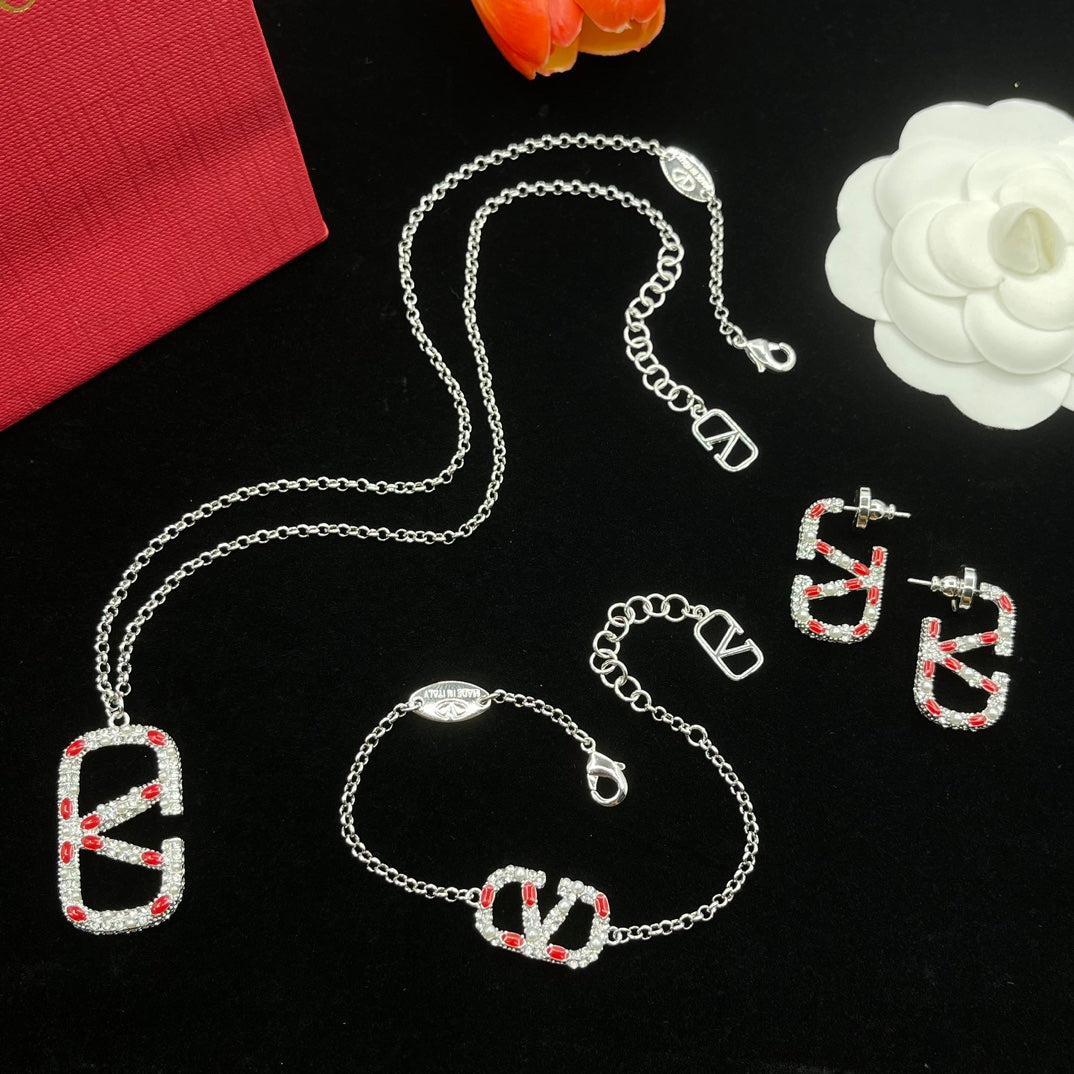 Vintage-Schmuckset aus Silber mit Diamant-Logo
