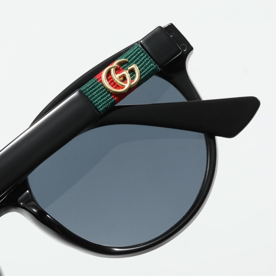 Retro-Ovale gestreifte Strick-Sonnenbrille