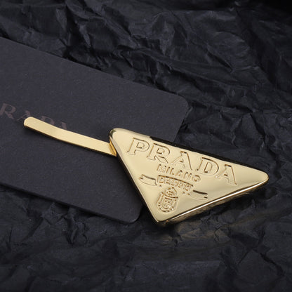 Dreieck-Logo Goldene Haarspange