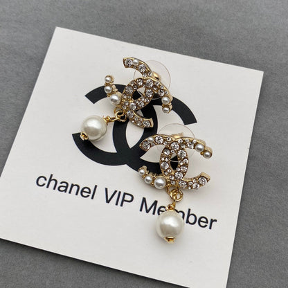 Perlenohrringe mit Diamanten