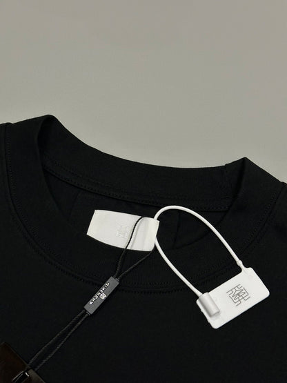1105 Neues klassisches T-Shirt mit Monogramm-Print