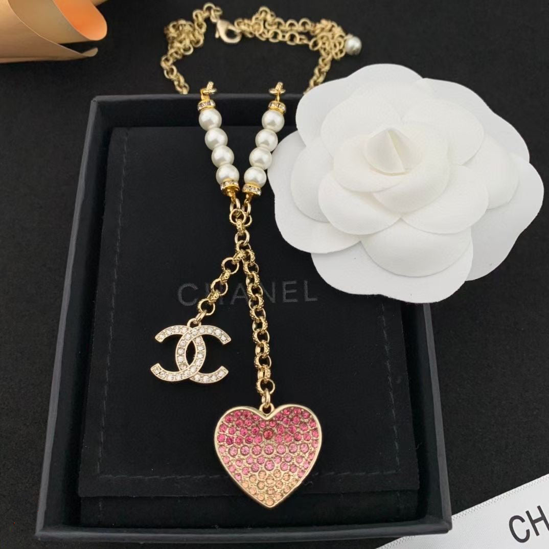 Perlenkette mit rosa Herzanhänger