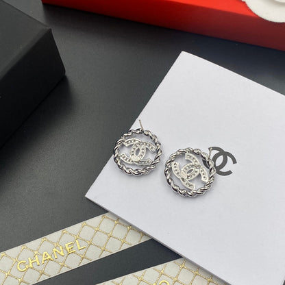 Feine glitzernde Zirkon-Ohrstecker, rund