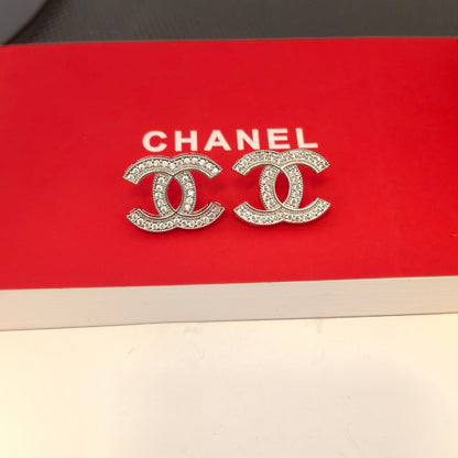 Elegante Logo-Ohrringe aus Silber und Gold