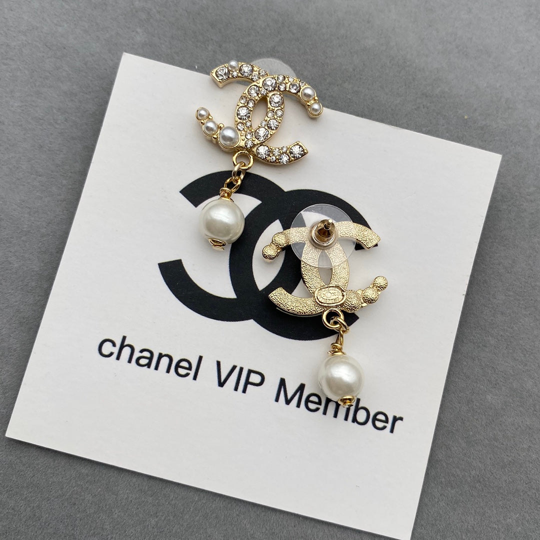 Perlenohrringe mit Diamanten