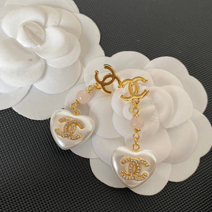 Premium Glasohrringe Herz Perle