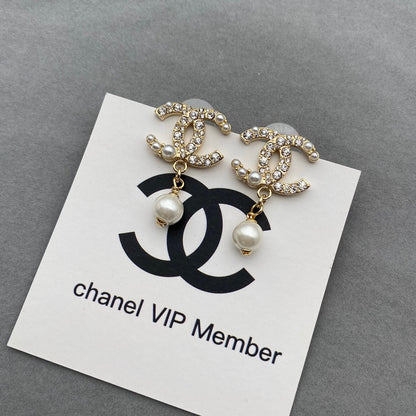 Perlenohrringe mit Diamanten