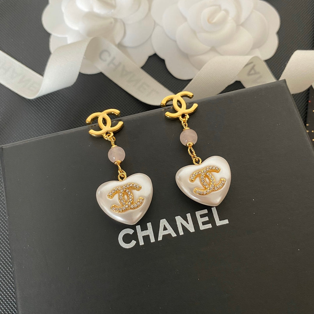 Premium Glasohrringe Herz Perle