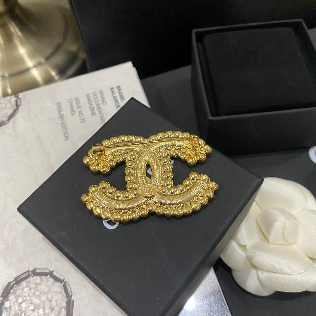 Premium Diamantbesetzte Goldbrosche