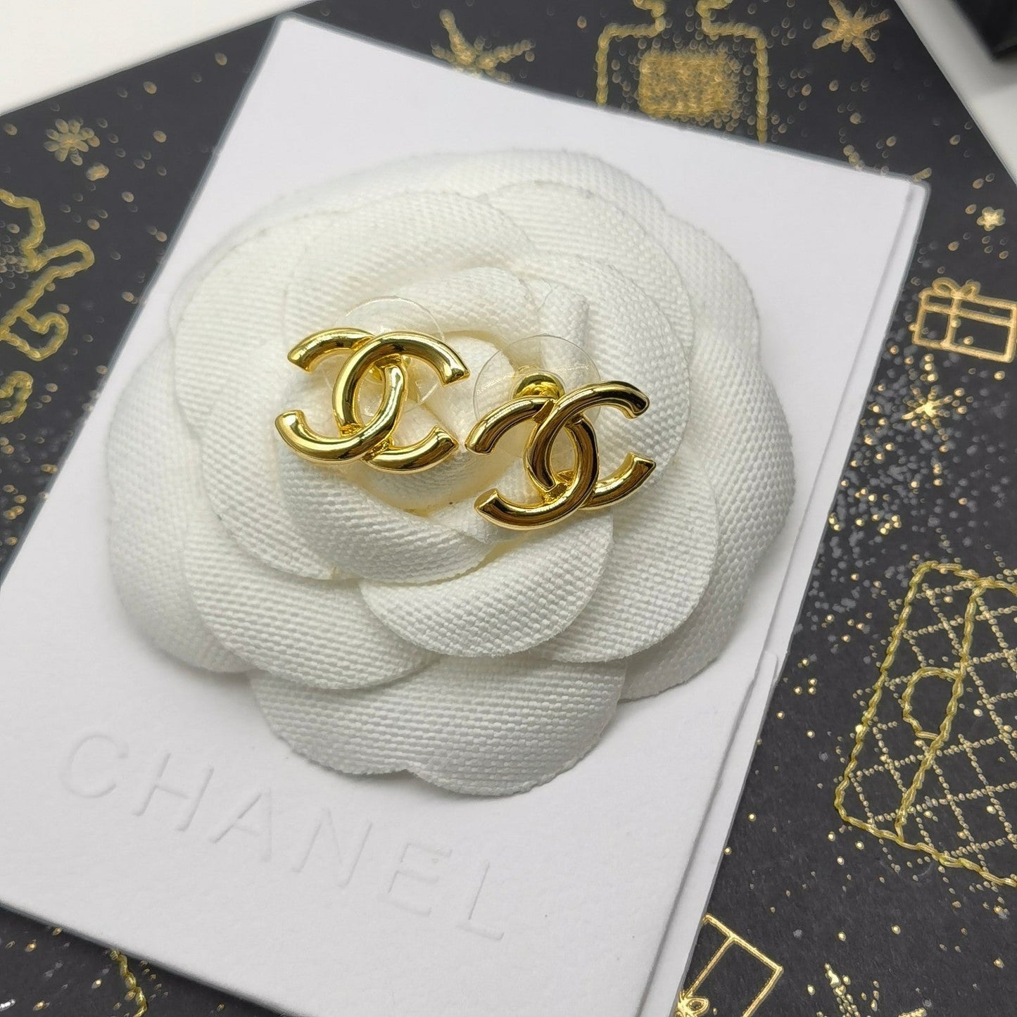 Ohrringe Gold-Doppel-C