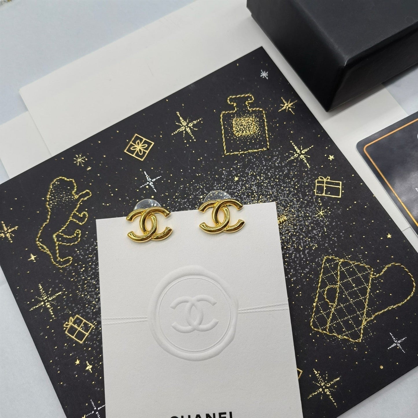Ohrringe Gold-Doppel-C