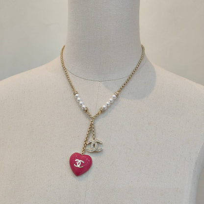 Perlenkette mit rosa Herzanhänger