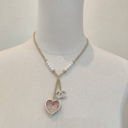 Perlenkette mit rosa Herzanhänger