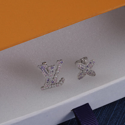 Lila Strass-Logo-Ohrringe