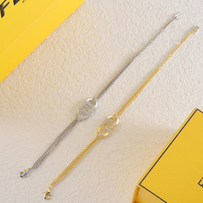 Armband mit ineinandergreifenden F-Kristallen