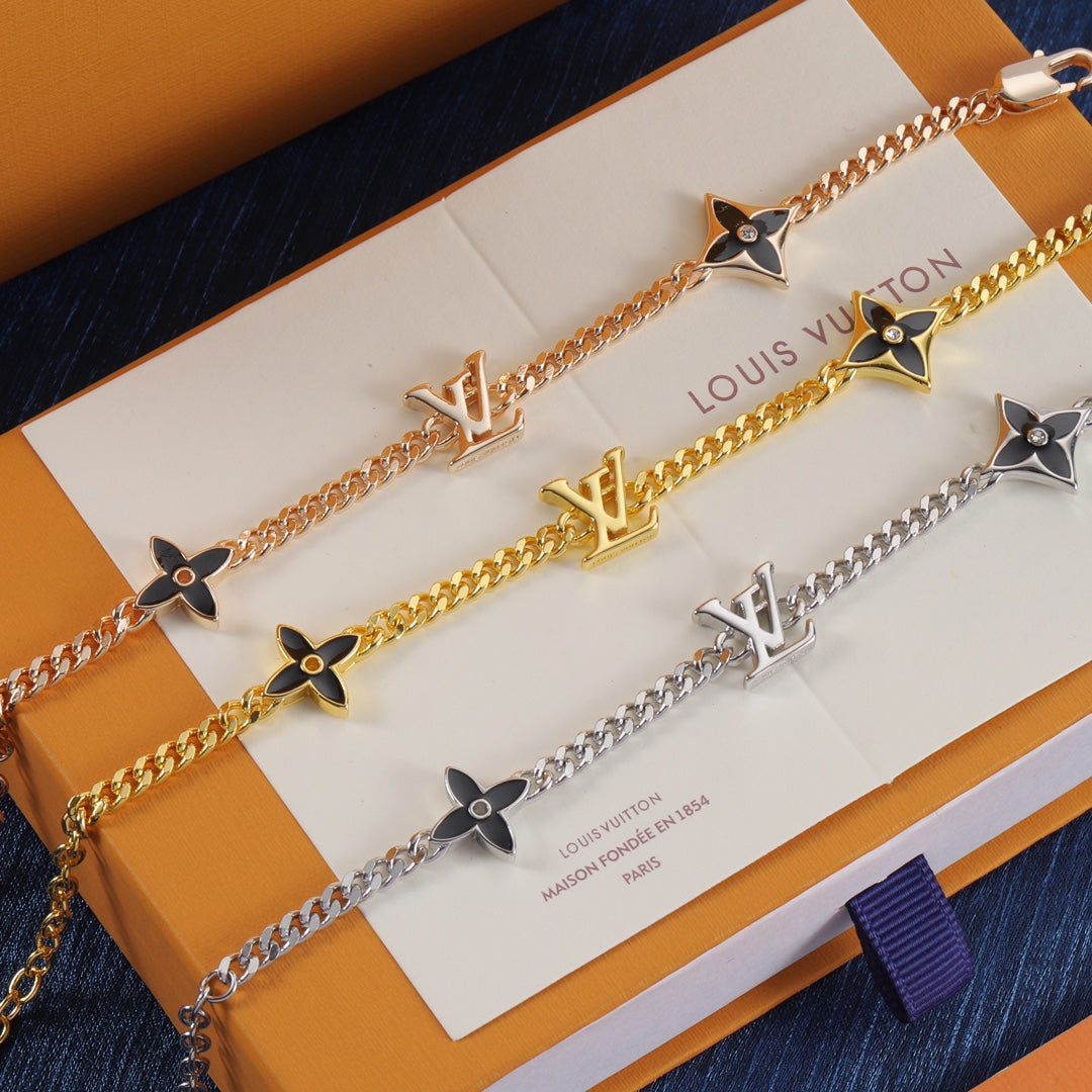 Schwarzes vierblättriges Kleeblatt Metallarmband