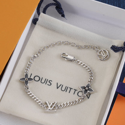 Schwarzes vierblättriges Kleeblatt Metallarmband