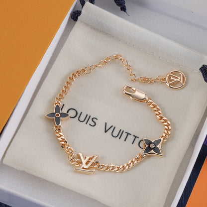 Schwarzes vierblättriges Kleeblatt Metallarmband