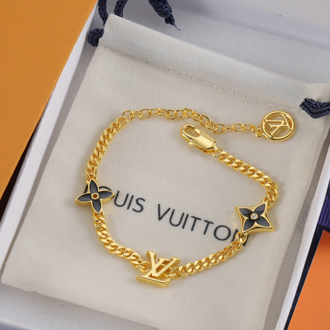 Schwarzes vierblättriges Kleeblatt Metallarmband